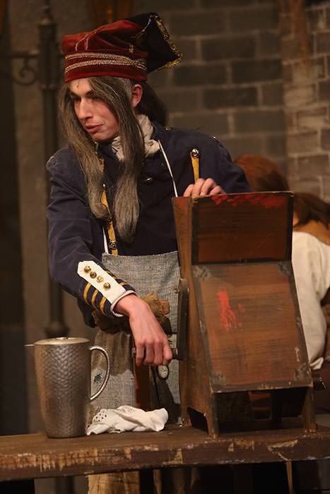 Monsieur Thernardier With Meat Grinder In Hat And Apron